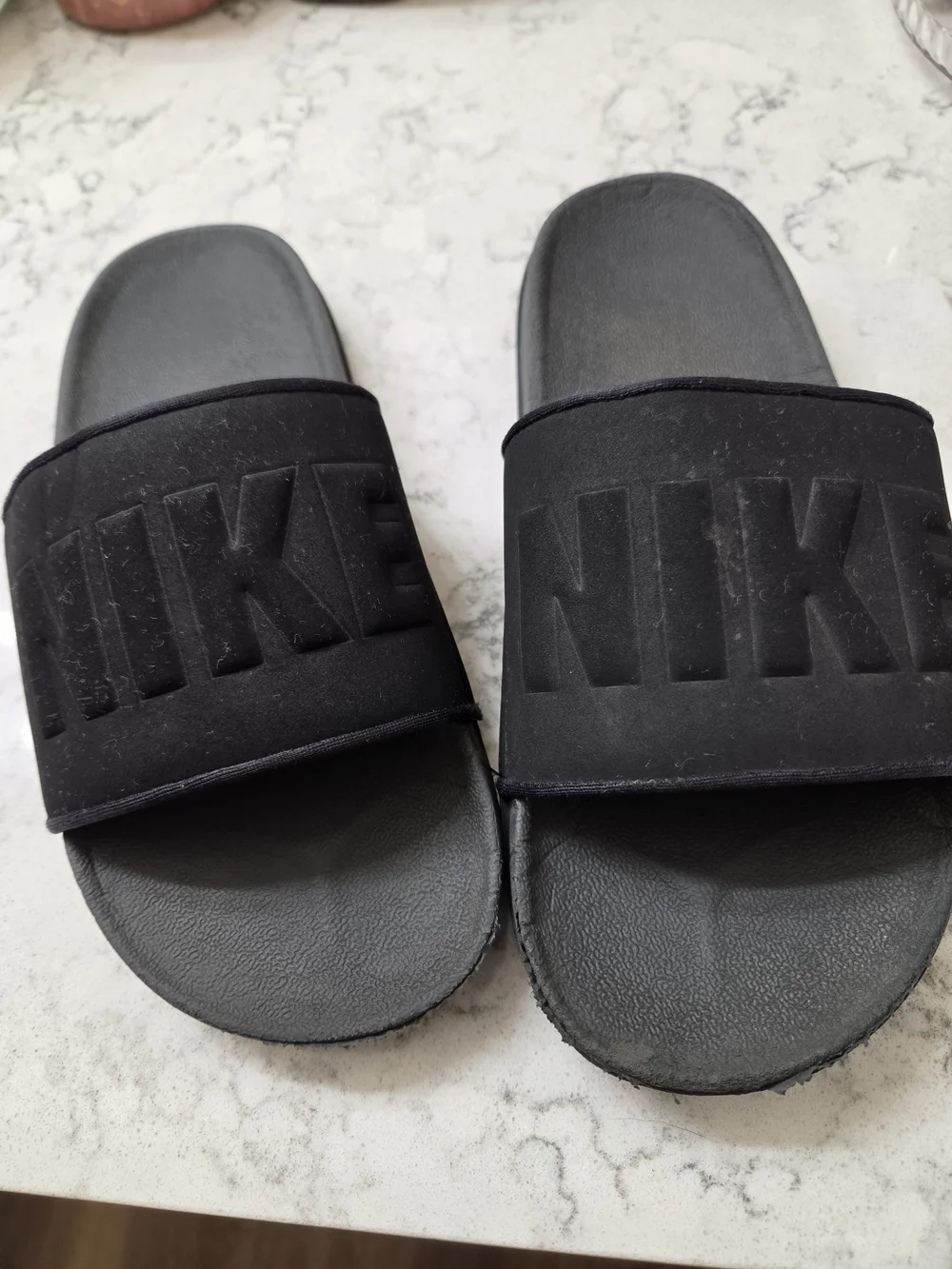 Nike Black Slide Sandals with Embossed Logo Strap